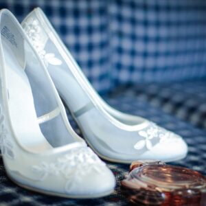 white leather peep toe pumps